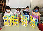 3D apartment block pop-up art craft in poster colour by children, age 5 to 6, from our children art class